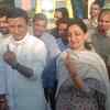 Congress candidate Randeep Surjewala and his wife after casting the vote in Kaithal