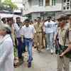 Jaya Bachchan, Abhishek Bachchan and Aishwarya Rai Bachchan leave after casting their vote at a polling booth in Juhu, Mumbai.