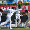 Article image for: Saha, Rohit and Mayank celebrate <i class="tbold">Theunis de Bruyn</i> wicket.