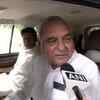 Congress leader Bhupinder Singh Hooda leaves after meeting Sonia Gandhi