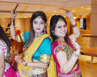 Ladies step out in style to attend a dandiya night