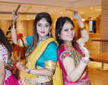 Ladies step out in style to attend a dandiya night