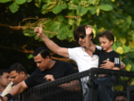 SRK and Abram wave to the crowds