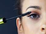 Use a clean mascara wand to soften clumpy lashes