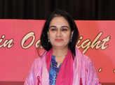 Breast cancer survivors walk the ramp at an event