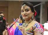 Ladies enjoy at a dandiya party