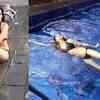 Article image for: Monalisa looks smoking hot in black bikini as she spends her 'day off' in a swimming pool
