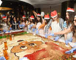Hyderabad folk enjoy a fancy cake-mixing