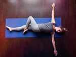 Supta Jaṭhara Parivartānāsana