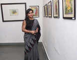 Art lovers attend a flowery show at Lalit Kala Akademi