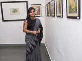 Art lovers attend a flowery show at Lalit Kala Akademi