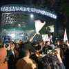 Students gathered outside the police headquarters at ITO
