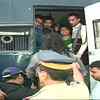 Police force protesters into vans to evict from Gateway of India