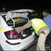 Police check vehicles at Delhi-Gurugram border ahead of the voting in Delhi