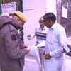 Voters start arriving at a polling station in Jhandewalan area, in Karol Bagh assembly constituency