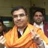 BJP MP Parvesh Verma casts his vote at a polling station in Matiala assembly constituency. (ANI)