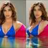 Water babe! Pulls off a sultry pose in a blue bikini with a pink shrug