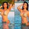 Sexy siren slips into a sequin bikini and flaunts her well-chiselled body