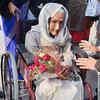Delhi's eldest voter, Kalitara Mandal (110 years), was felicitated after she cast her vote at a polling booth in Chittaranjan Park.
