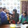 Arvind Kejriwal celebrates with wife Sunita as AAP takes big lead.