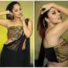 Anasuya Bharadwaj’s postures in a designer saree will make you go weak in the knees