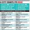 A city counts its dead