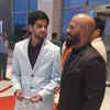 Badminton star Sai Praneeth sharing a candid moment with weightlifter Sathish Sivalingam
