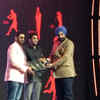 National Rifle Association of India president Raninder Singh receiving the 'Federation of the Year' award