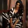 Sai Tamhankar looks stunning as she strikes a perfect pose in black and white dress
