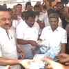 DMK Chief MK Stalin distributes kits of soap, hand sanitizer and face mask to media personnel and staff at the assembly in Chennai