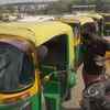 Autorickshaws being disinfected at East Vinod Nagar Bus Depot as part of the Delhi government's initiative to disinfect private passenger vehicles free of cost.