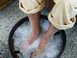 Soak your feet in soapy water