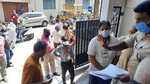 People queue up at DCP offices across Kanrnataka to collect passes during lockdown