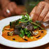 Avoid touching cooked food with hands