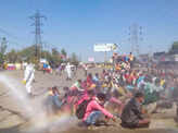 Coronavirus: Pictures of migrant workers sprayed with disinfectant in UP go viral