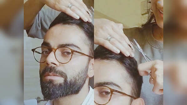 Virat Kohli gets a haircut from wife Anushka Sharma