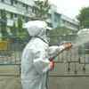 Disinfectants are being sprayed outside MR Bangur Hospital in Kolkata. An Inter Ministerial Central Team is inspecting this Covid-19 facility