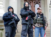 In pics: Armed protesters storm Michigan State House over COVID-19 lockdown
