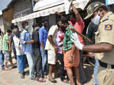 In pics: Long queues outside liquor shops as govt relaxes lockdown