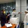 Indians, who arrived from Dubai, are being screened at Karipur Airport in Kozhikode