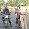 Police personnel check vehicles at Delhi-Gurugram border, amid Coronavirus Lockdown. Individual inter-state and inter-district movement have been curtailed in Gurugram in a bid to contain coronavirus cases.