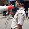 Policemen in Kolkata creating Covid awareness through public announcements