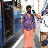 Temperature check done for passengers travelling to other districts from Coimbatore mofussil bus stand