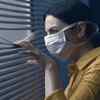 How long is a person suffering from COVID-19 contagious?