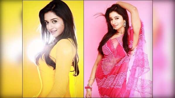 Flaunts her irresistible figure and killer smile in glittering outfits