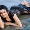 Relaxes on the beach in an eye-popping avatar