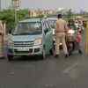 Delhi: Police personnel check vehicles at Ghazipur-Ghaziabad (Uttar Pradesh) border