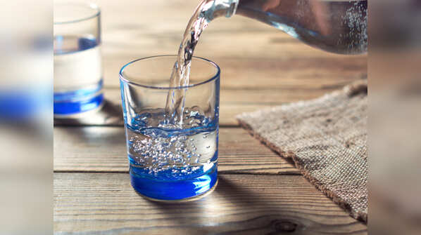Drinking water right before or after having a meal
