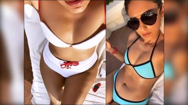 Soaks under the sun and flaunts her bikini body to perfection