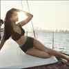 Shows off her mesmerising beauty in a black bikini